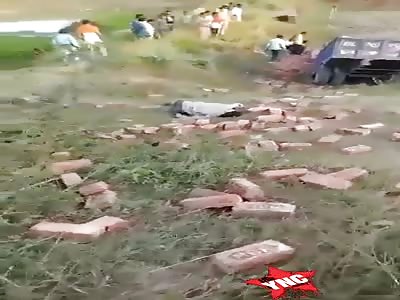 fatal accident, truck tip over with brick