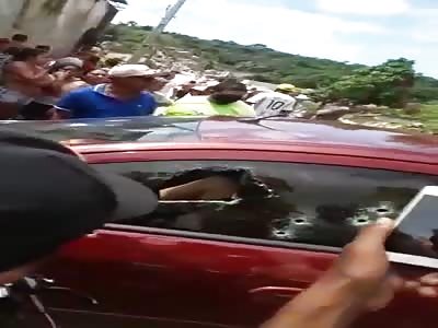 man killed inside his car with multiple shots