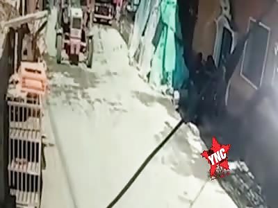 Small boy in tractor accident.