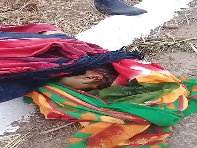 Corpse wrapped in blankets.