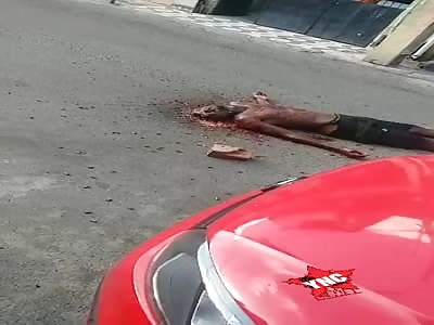 Man with head shattered by stones