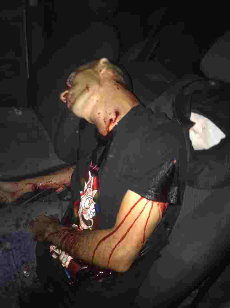 Shot to death inside his car