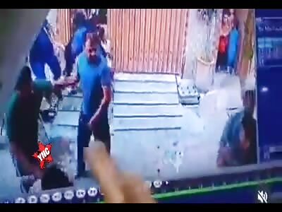 Woman murdered at the door of her house