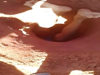 body buried head with feet out