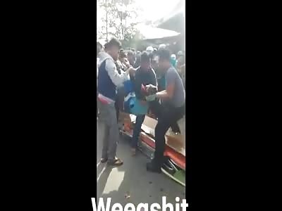 Picking up dead body