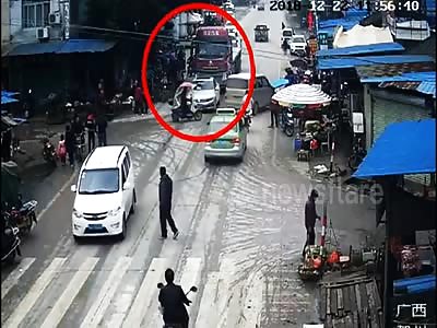 Two pedestrians narrowly escape death after being knocked down 