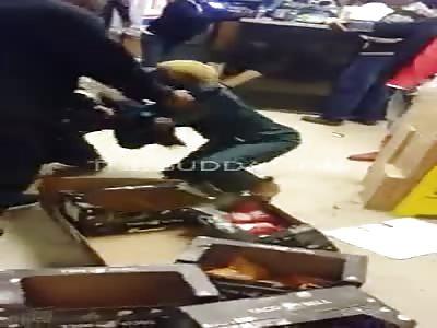 Woman Swings On A Man Inside A Gas Station!