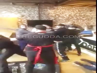 Dude Gets KO Out Cold With A Vicious Headbutt Inside A Pizza Joint!