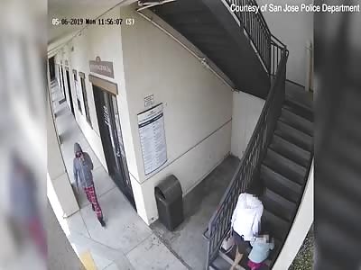 A man snags the purse out of a woman's hand...