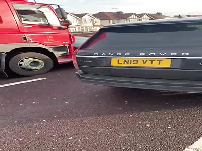 Full video of truck dragging sedan on highway