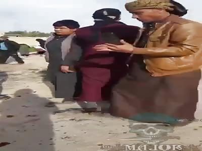 Turks hit a column of civilian refugees.  Video of the impact site.