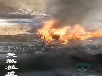 Man being burned alive in fire.