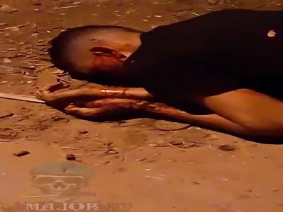 man dying with a headshot