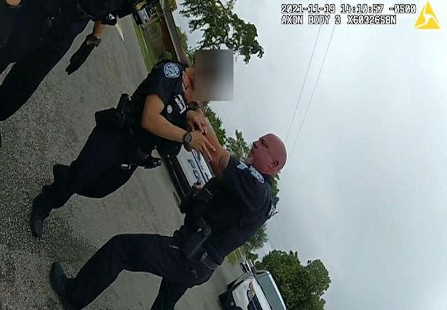 Male Officer Grabs Female Officer by the Throat and Chokes Her.