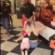 Black Bitch Beats White Woman in front of her Toddler.