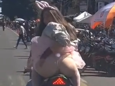 Woman on Back of Bike Cucks her Boyfriend