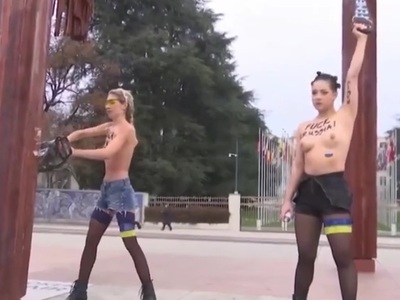 Anti-Russian Nude Protest involves a Chainsaw (Uncensored)