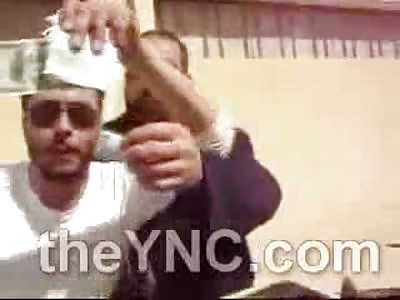 Men in Libya Loot the Bodies of Mercanaries and take American Money