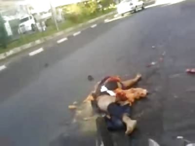 Man lies in his Entire Digestive System in the Street after being Crushed by Truck