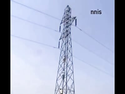 Man Hangs from Power Lines and....Lets Go in Front of Cameras