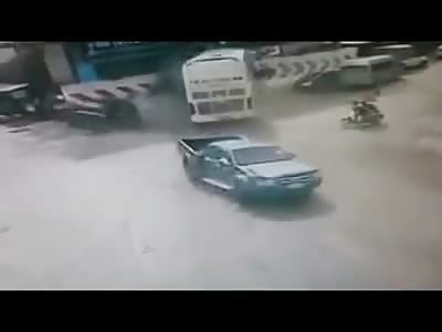 Bus on the Loose Crushes Car up Against Wall