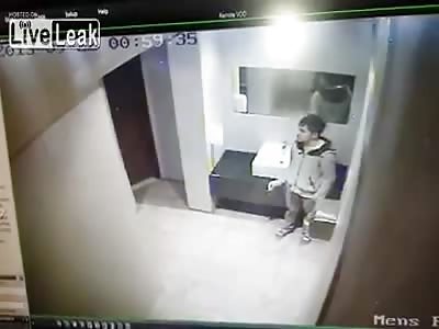 Bouncer Hits Guy Smoking Weed in the Bathroom