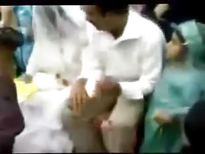 Beating the bride in the wedding ceremony