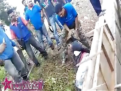 KIDNAPPER BEATEN BY MOB