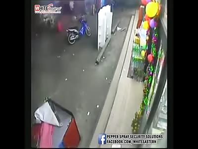 MAN BEING SLASHED OUTSIDE A SHOP