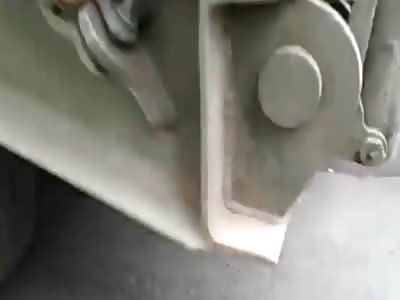 Motorcyclist Spread Across Pavement